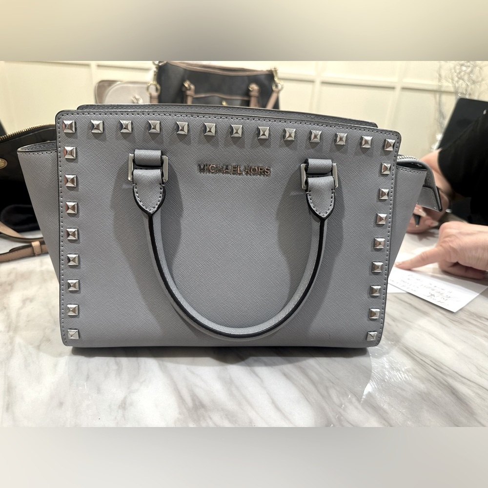 Authentic Michael Kors medium size hand held bag
